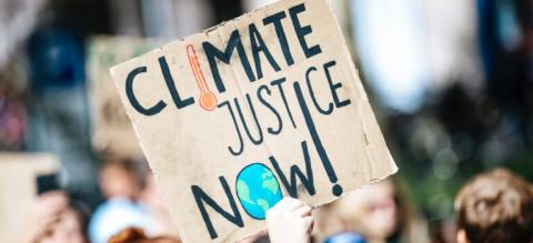 Climate justice sign
